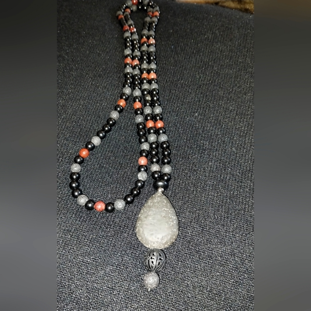 Carnelian, obsidian, and lava rock necklace.